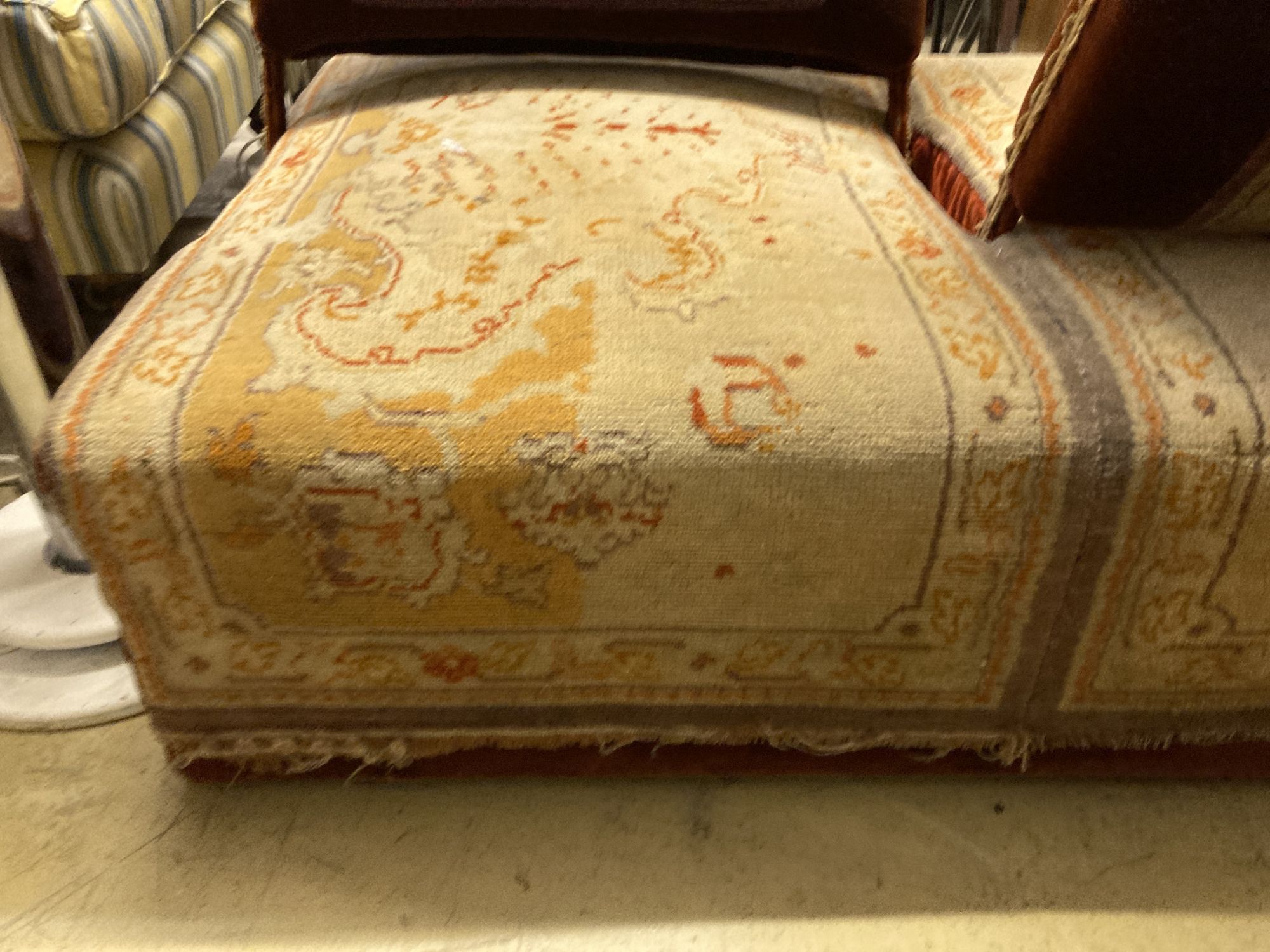 A Victorian carpet upholstered conversation seat with hinged adjustable back rests, length 134cm, depth 86cm, height 84cm